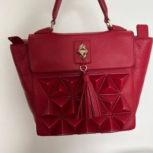 Sofia Al Asfoor Borla in red